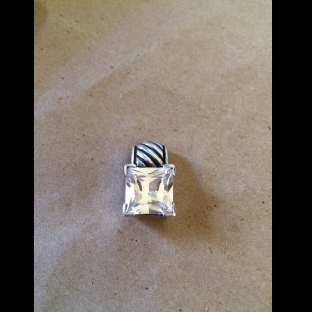 Sterling silver with clear stone